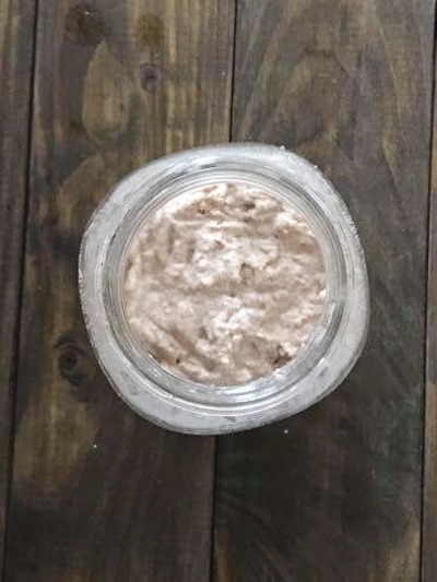 water and flour mixed in a mason jar