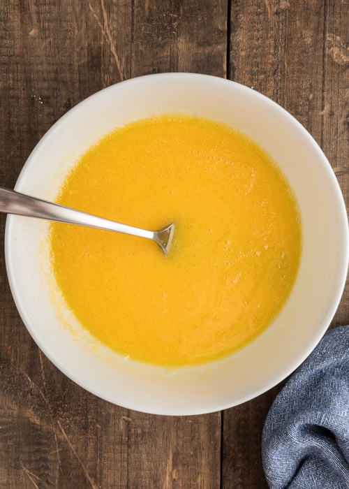 The wet ingredients mixed in a white bowl.