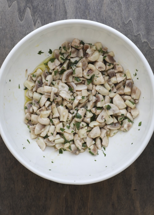 The mushrooms tossed with parsley and olive oil.