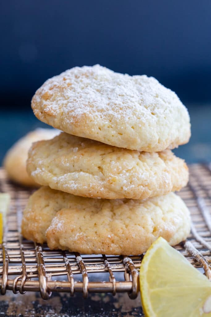 Three drop cookies stacked on a wire rack.