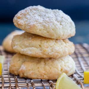 Three drop cookies stacked on a wire rack.