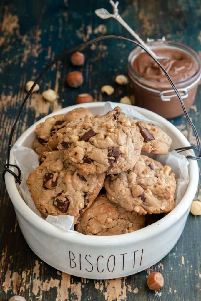 Cookies in a white biscotti bowl.