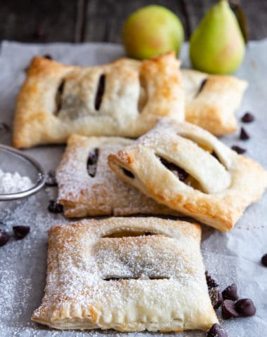 5 pear pastries on a white paper