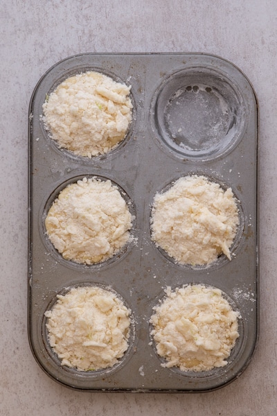 muffins in the pan before baking