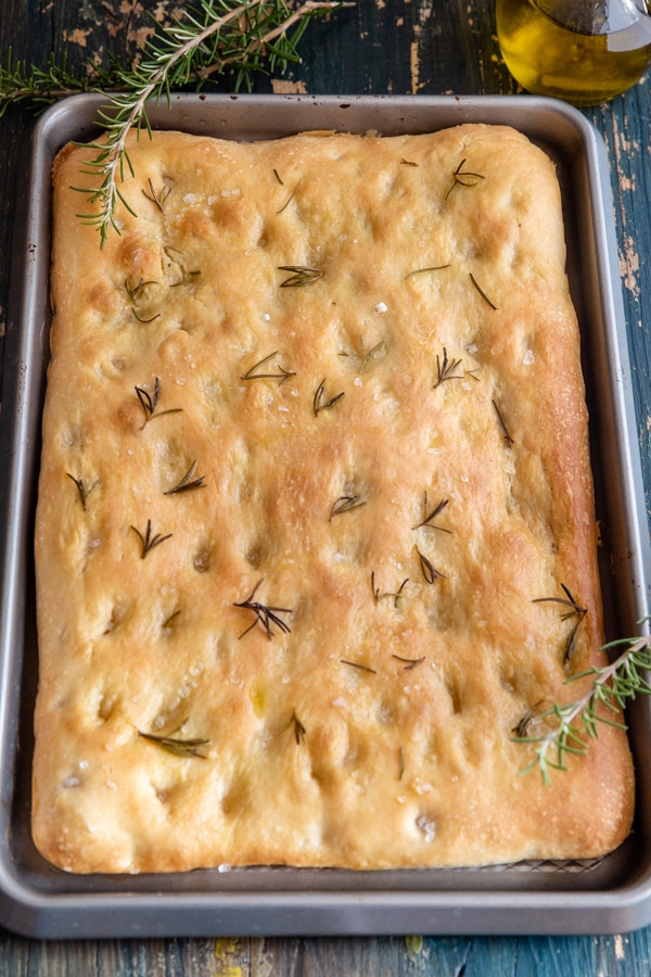 baked focaccia on a cookie sheet