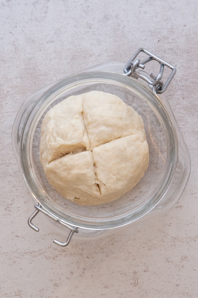marking the dough with a cross