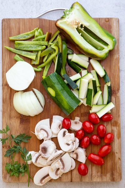 sliced vegetables on a wooden board
