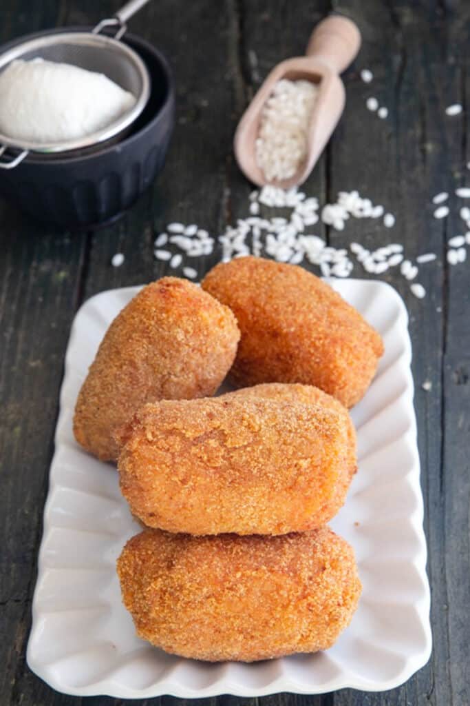 Suppli on a white dish.