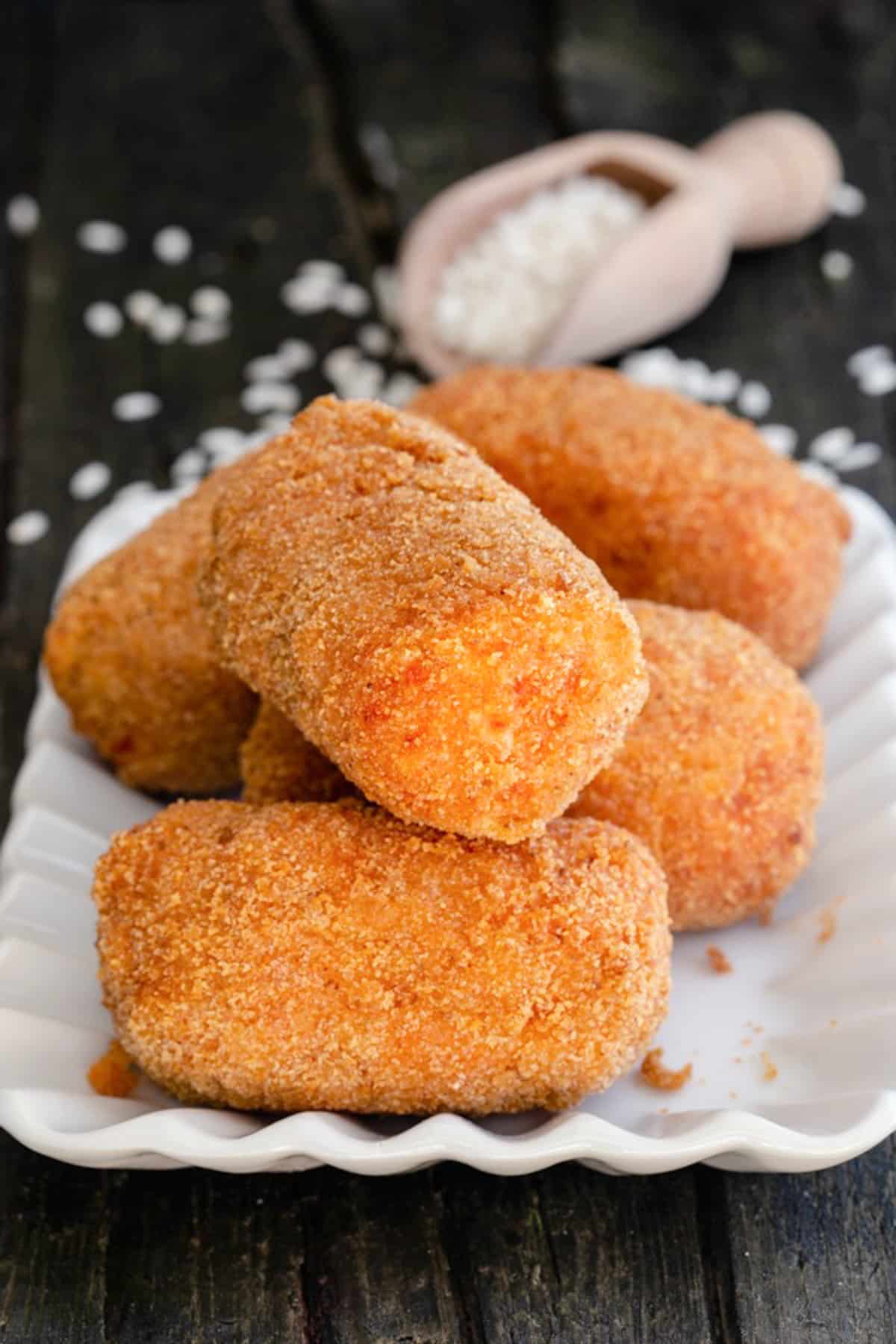 Suppli on a white dish.