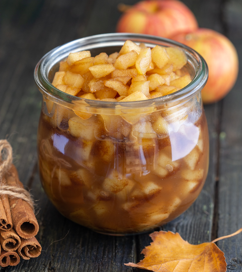 caramelized apples in a glass jar