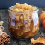 Apples in a glass jar.