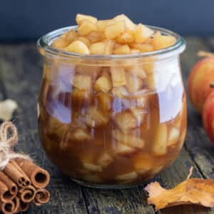 Apples in a glass jar.