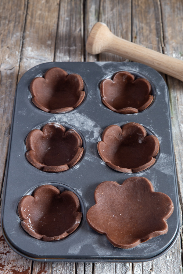 tarts cut outs in a muffin tin