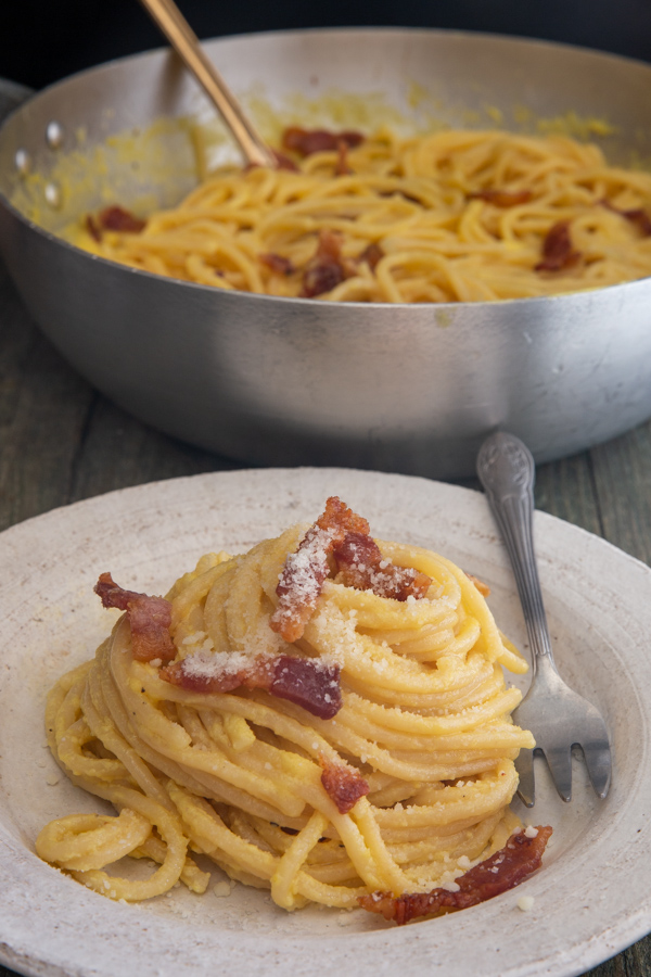 carbonara in a pan and on a plate