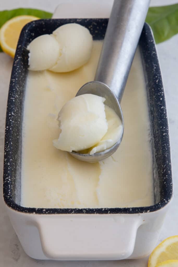 Ice cream in a white loaf pan.