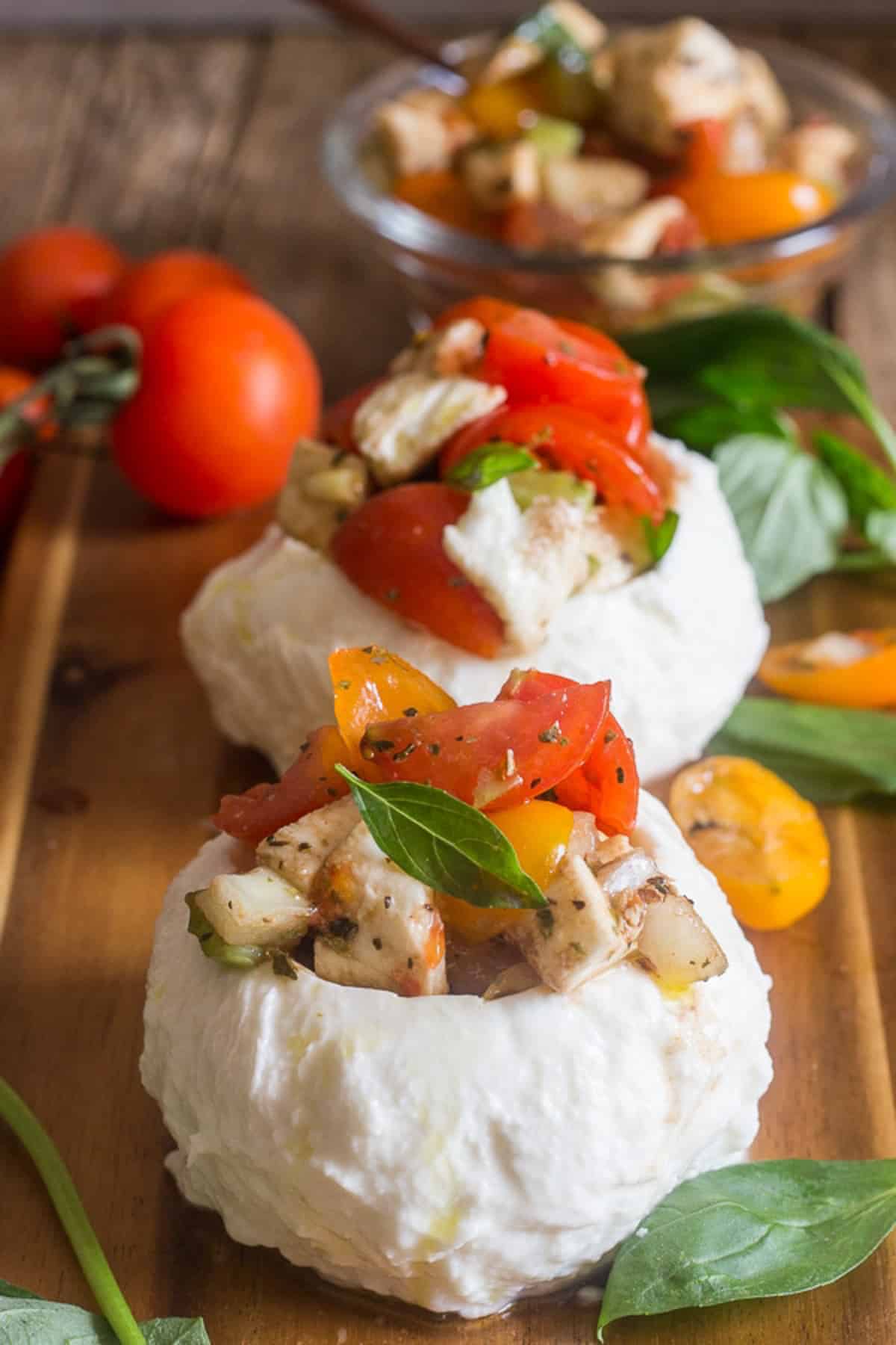 Stuffed caprese on wooden board.