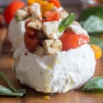 Stuffed caprese on wooden board.