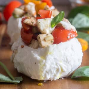 Stuffed caprese on wooden board.