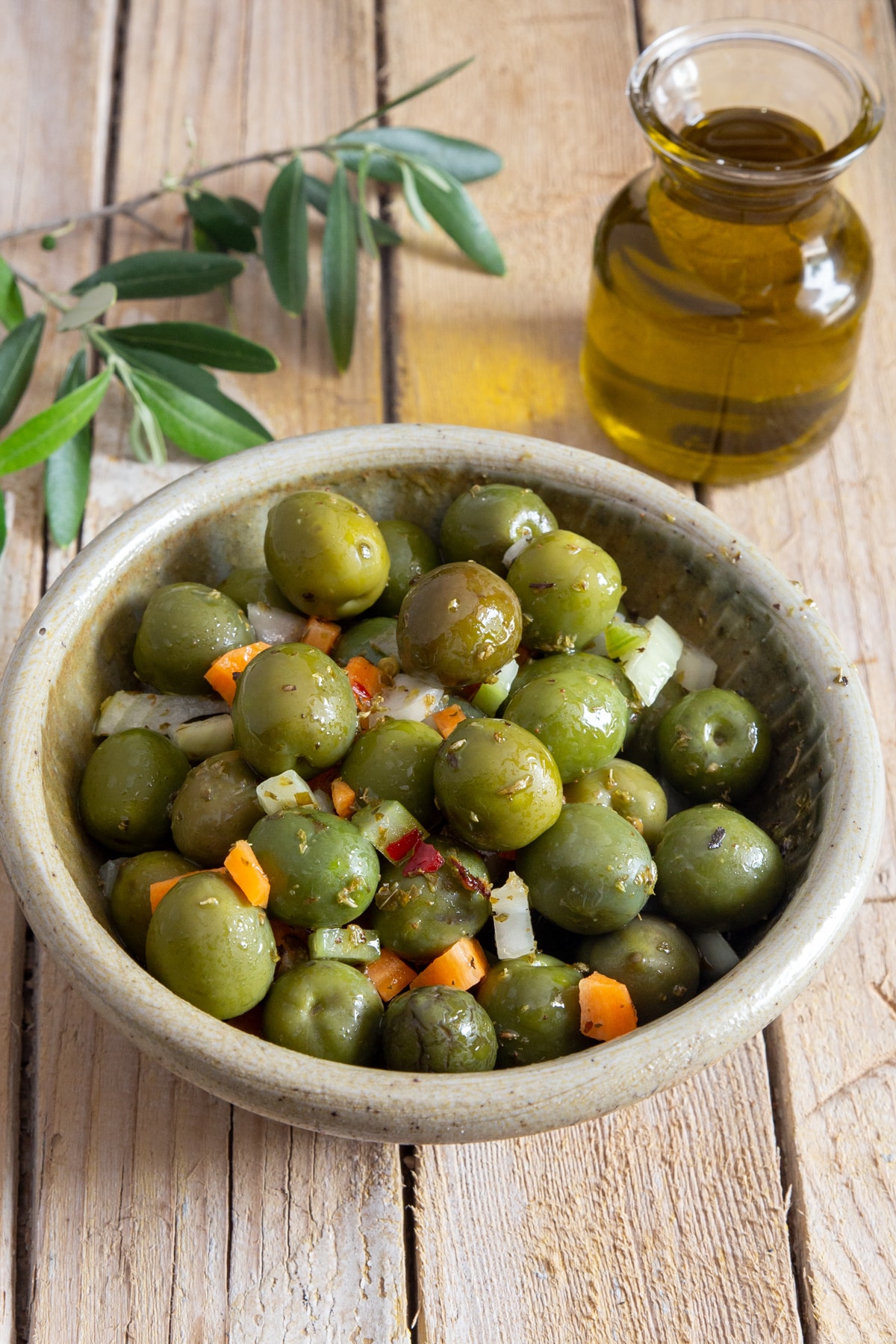 Olive salad in a white bowl.