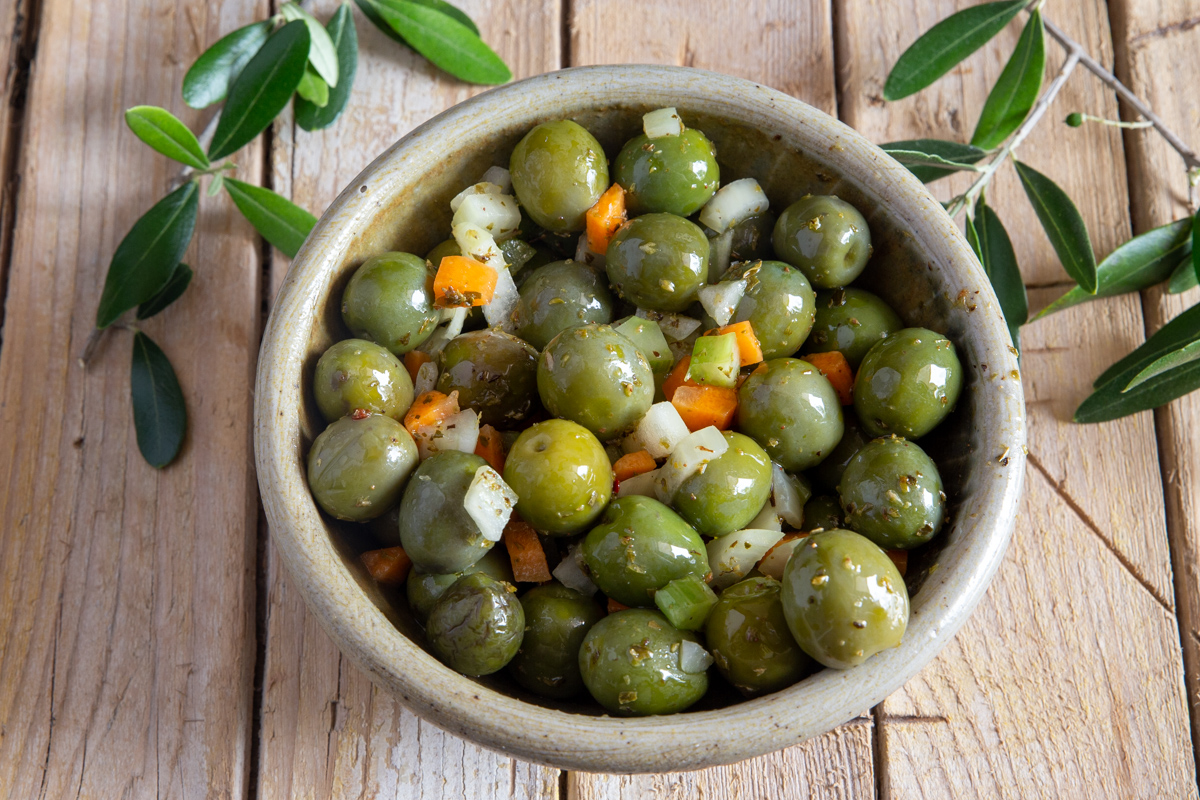 Salad in a grey bowl.