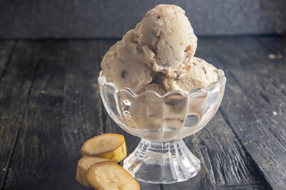 3 scoops of ice cream in a glass dish.