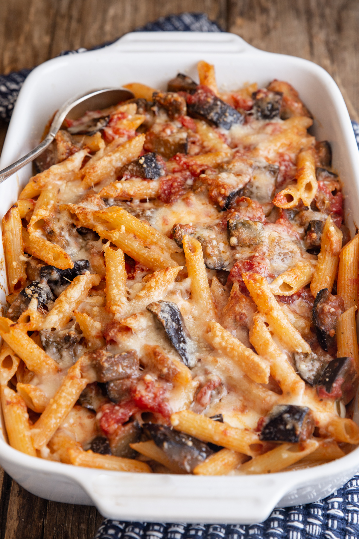 Sicilian pasta in a white baking dish.