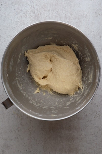 Dough smooth and elastic in the mixing bowl.