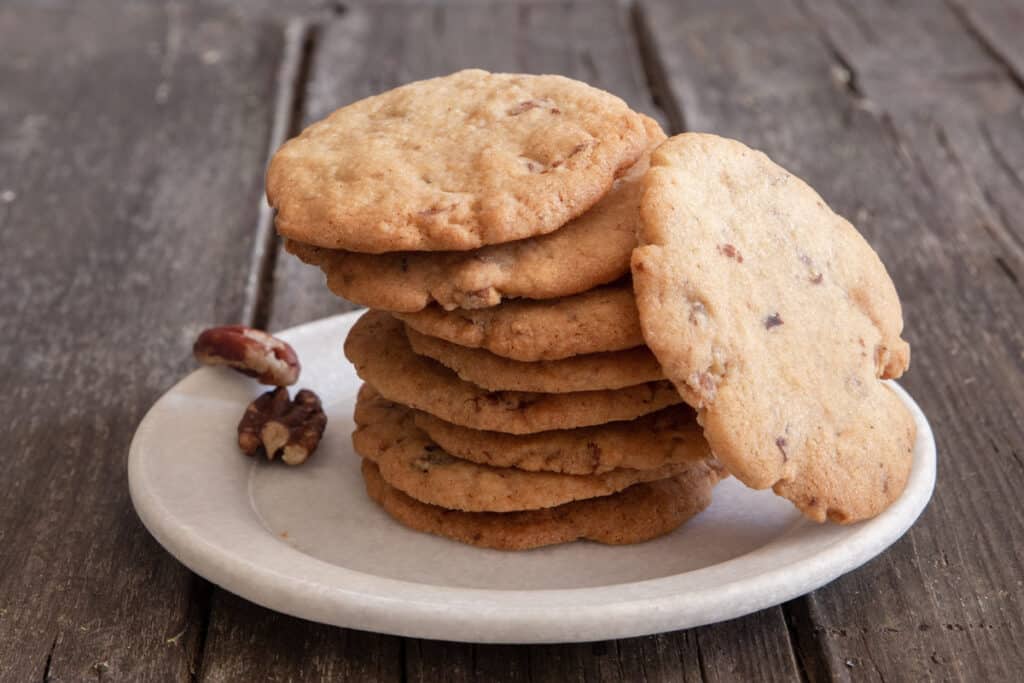 Cookies stacked with one leaning on them.