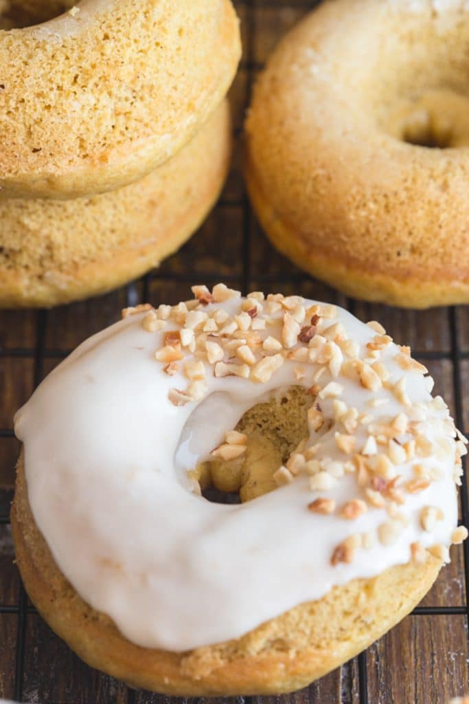 Pumpkin donuts with cream cheese glaze.