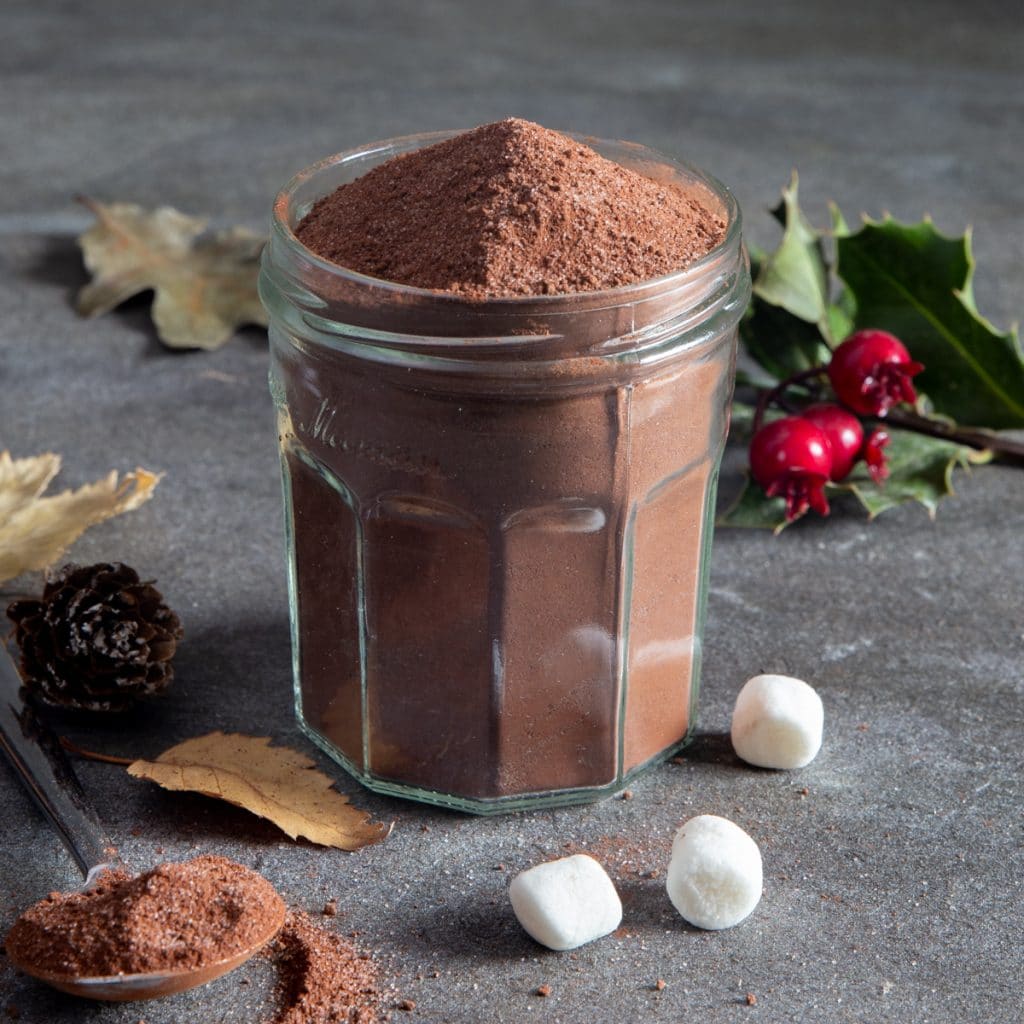 Hot chocolate mix in a glass jar.