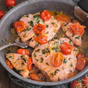 Tuna steaks in a pan.