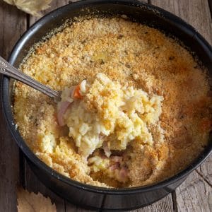 Rice casserole with a spoonful.