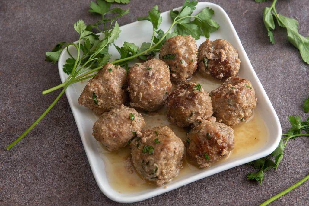 Meatballs in a white plate.