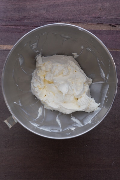 Cream cheese beaten in mixing bowl.
