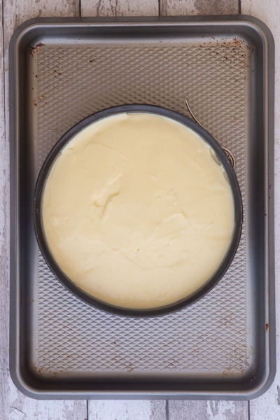 Cheesecake before baking in the pan.