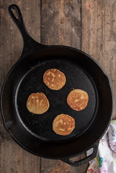 Making the welsh cakes in a black skillet.