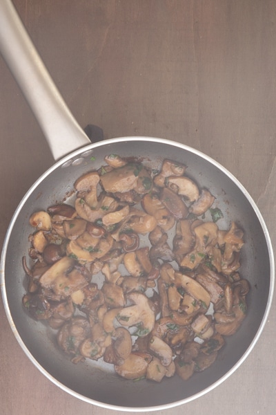 The mushrooms in the pan cooked.