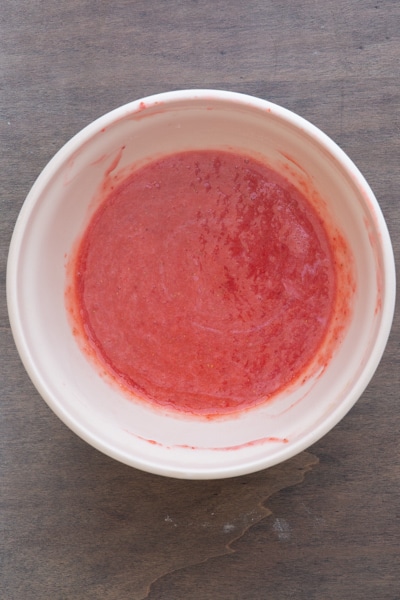 The gelatine mixed into the strawberry mixture.