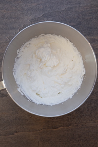 The whipped cream beaten until stiff.