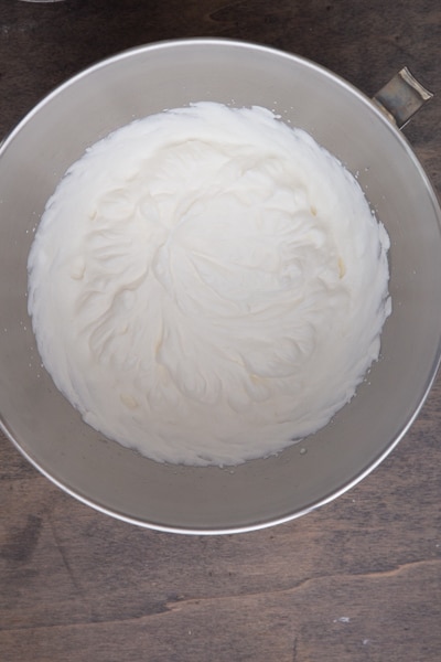 Whipped cream beaten to stiff peaks.