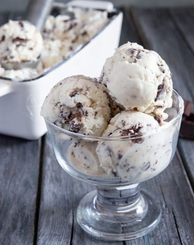 3 scoops of ice cream in a glass dish.