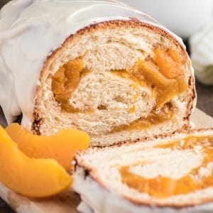 Peach swirl bread on a wooden rack.