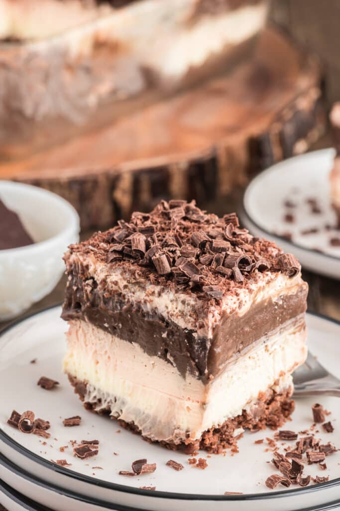 A slice of chocolate lasagna on a white plate.