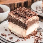 A slice of chocolate lasagna on a white plate.