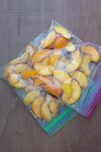 Peach slices in a re sealable bag.