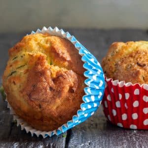 2 muffins with one on its side.