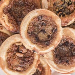 Butter tarts on a wire rack.