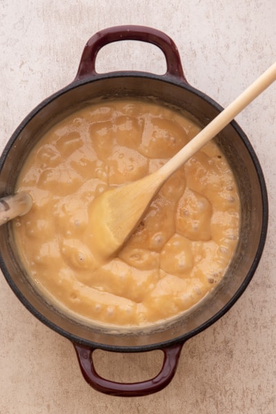 Making the toffee in a black pot.