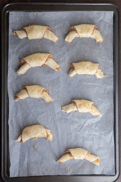 Dough rolled up and placed on parchment paper lined cookie sheet.
