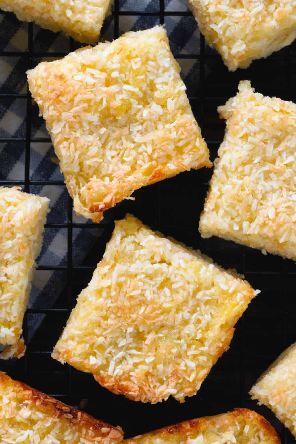 Coconut bars on a black board.